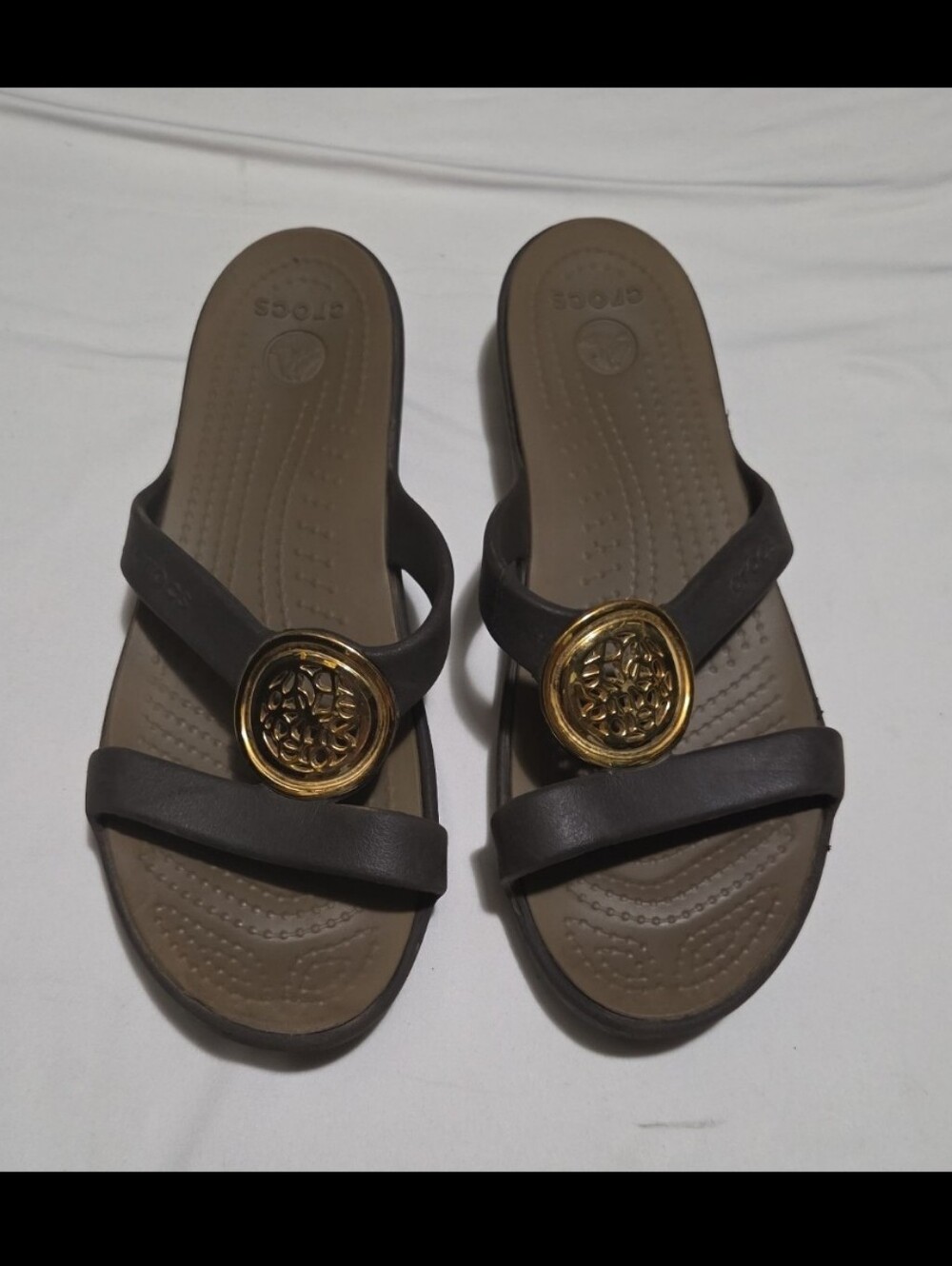 Crocs women's size 9 brown gold emblem sandals #29